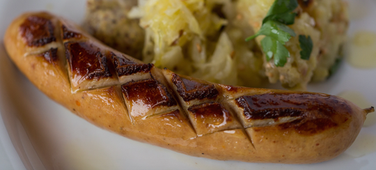Olympia Provisions Bratwurst and sauerkraut