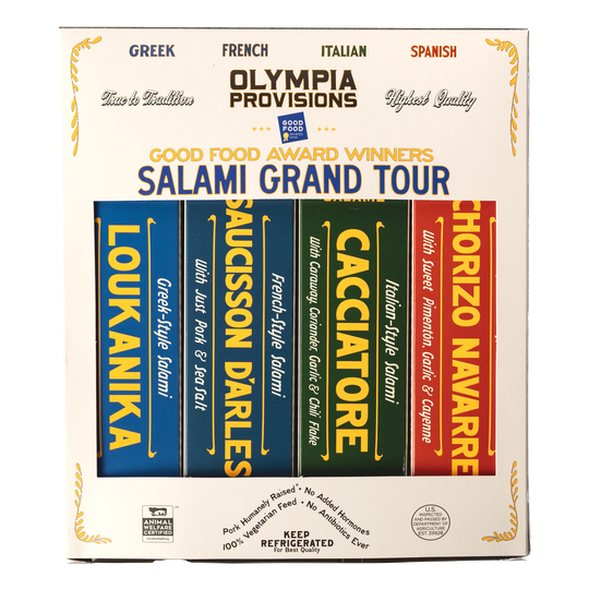 Four Olympia Provisions European-inspired salamis in boxes, packed in a cream box labelled "Good Food Award Winners Salami Grand Tour"